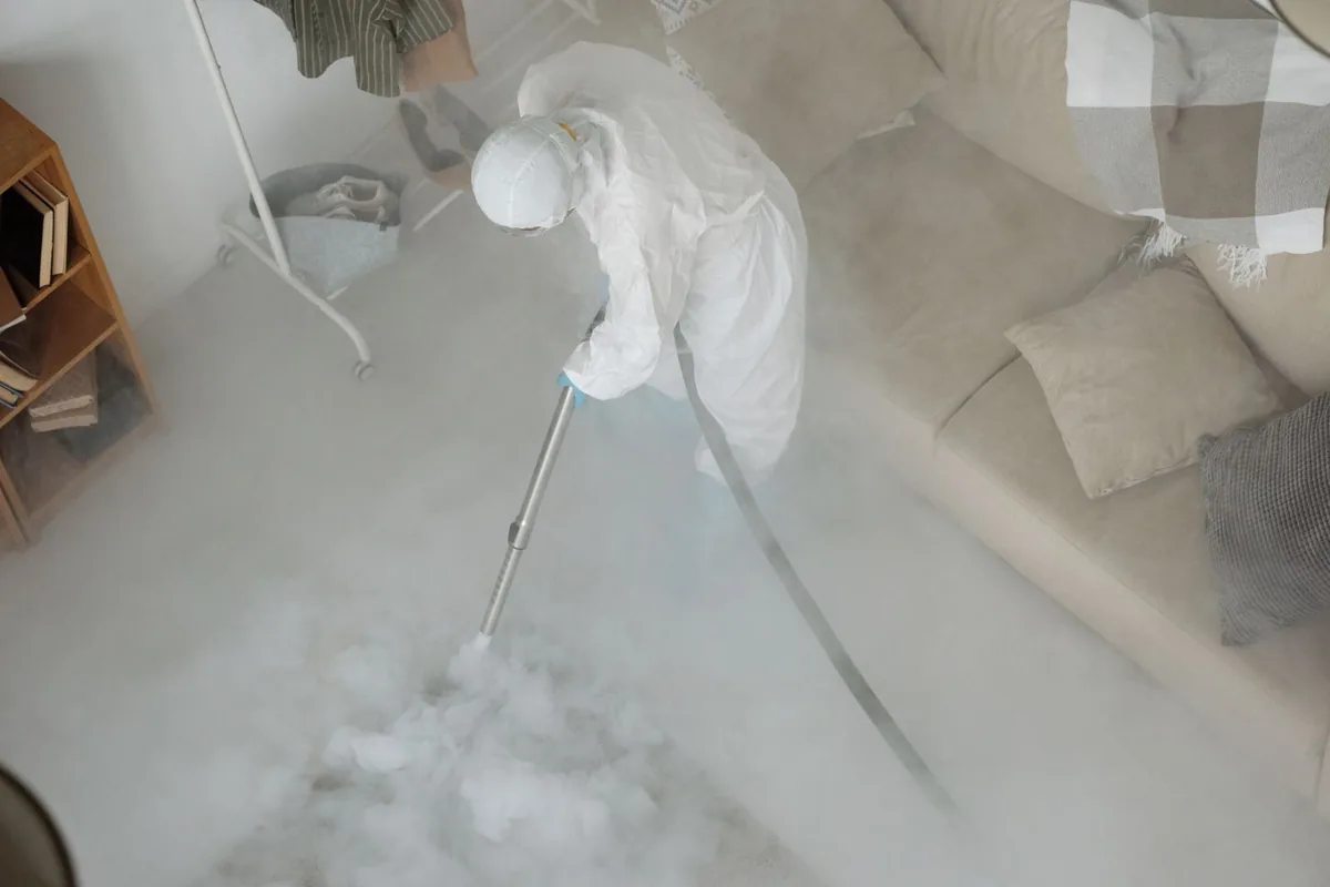 Biohazard cleanup technician in protective equipment, Riverbend, WA